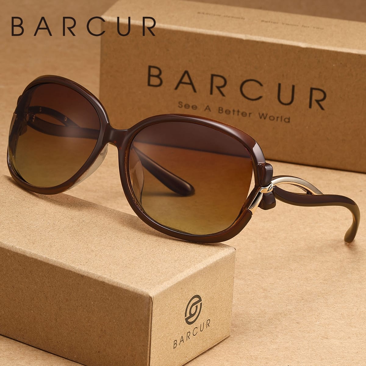 Brown sunglasses on a BARCUR branded box with 'BARCUR See A Better World' text in the background.